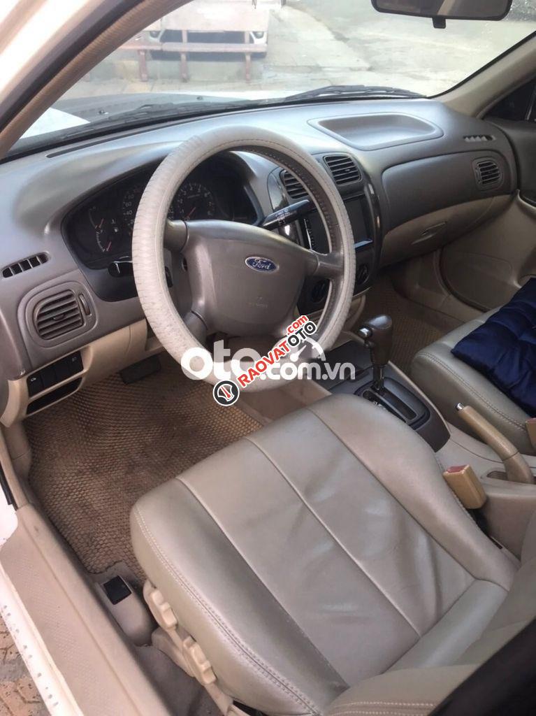Cần bán lại xe Ford Laser Ghia 1.8 năm sản xuất 2003, màu trắng số tự động-0