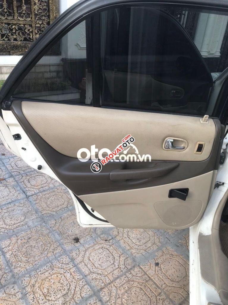 Cần bán lại xe Ford Laser Ghia 1.8 năm sản xuất 2003, màu trắng số tự động-1