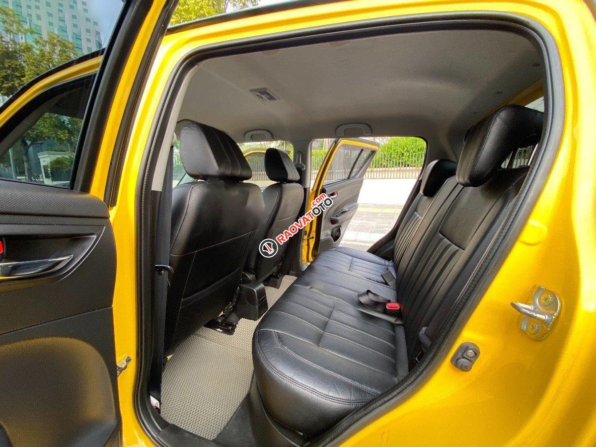 Bán Suzuki Swift 1.4 AT đời 2014, màu vàng, giá 345tr-3