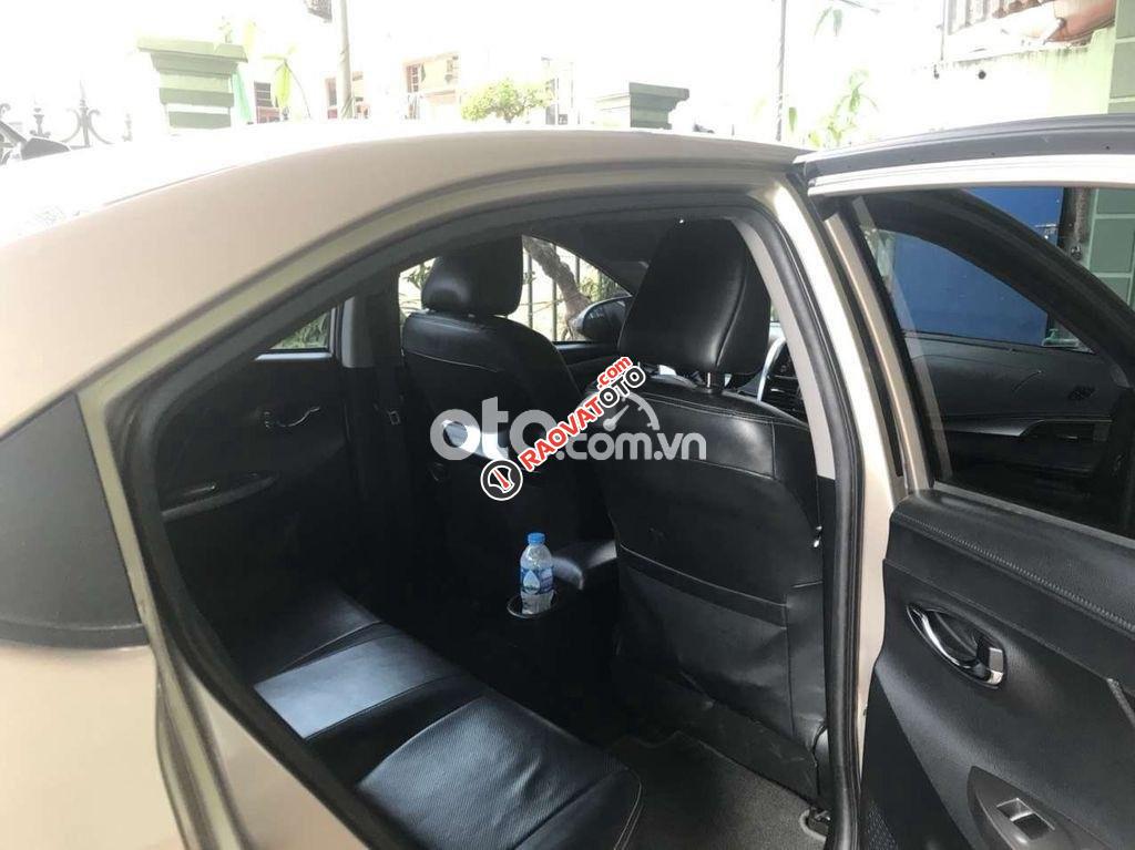 Cần bán xe Toyota Vios G sản xuất 2016, màu ghi vàng-2