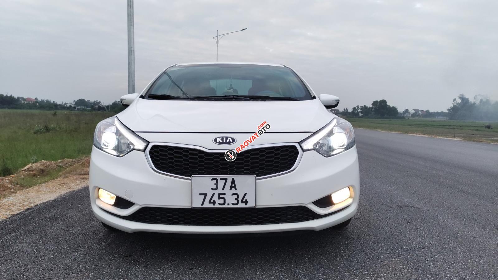 Cần bán Kia K3 1.6MT đời 2015, màu trắng còn mới, giá 375tr-0