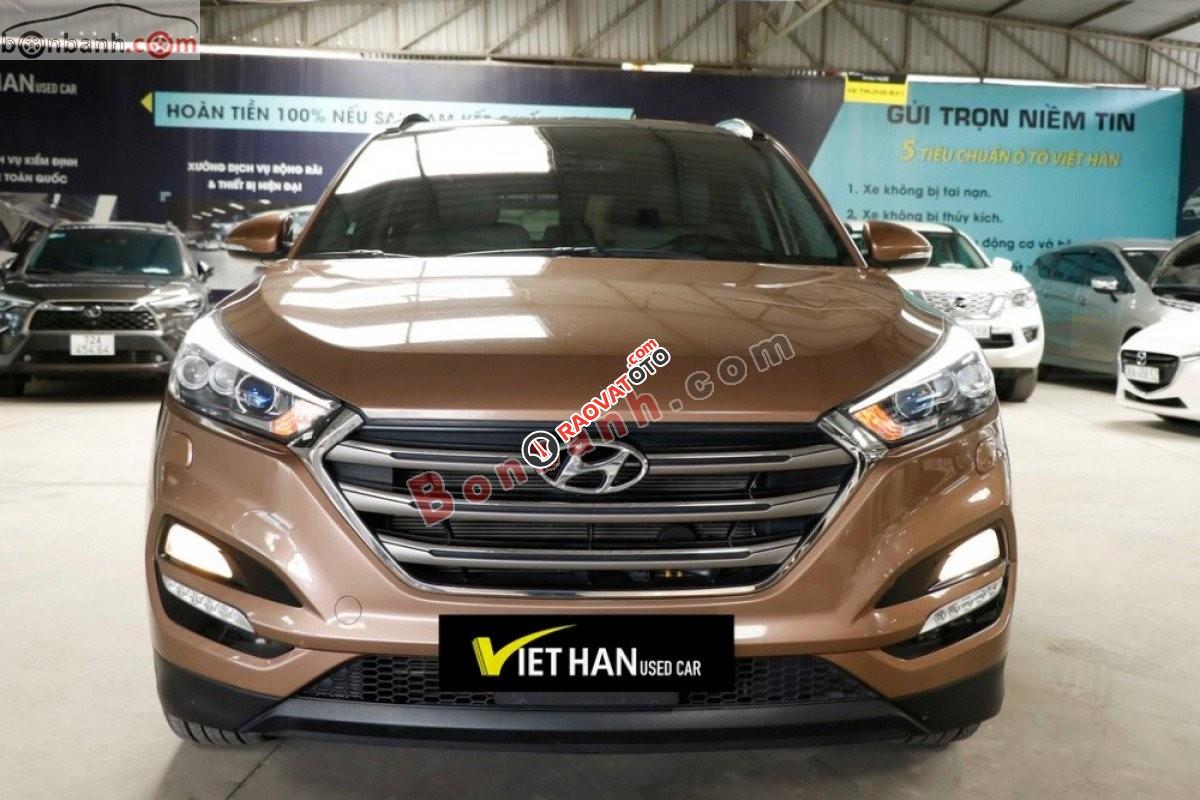 Bán xe Hyundai Tucson 2.0AT đời 2016, màu vàng nâu-1