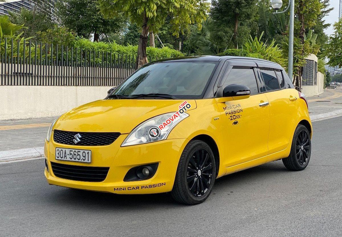 Bán Suzuki Swift 1.4 AT đời 2014, màu vàng, giá 345tr-6