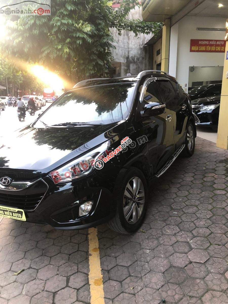 Bán xe Hyundai Tucson 2.0 AT sản xuất 2014, màu đen, nhập khẩu  -1