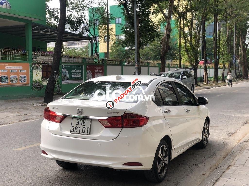 Cần bán xe Honda City AT 2016, màu trắng số tự động, giá 415tr-7