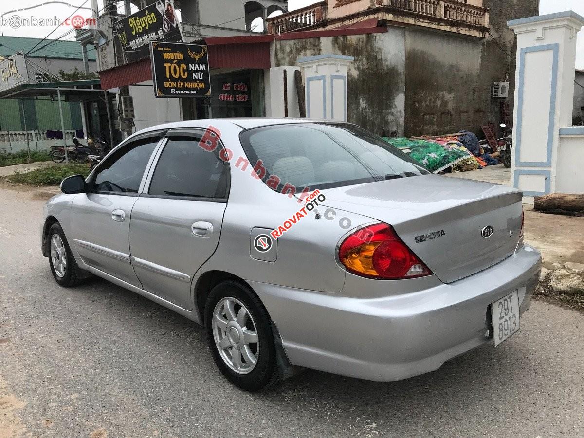 Cần bán Kia Spectra MT năm sản xuất 2003, màu bạc xe gia đình-6