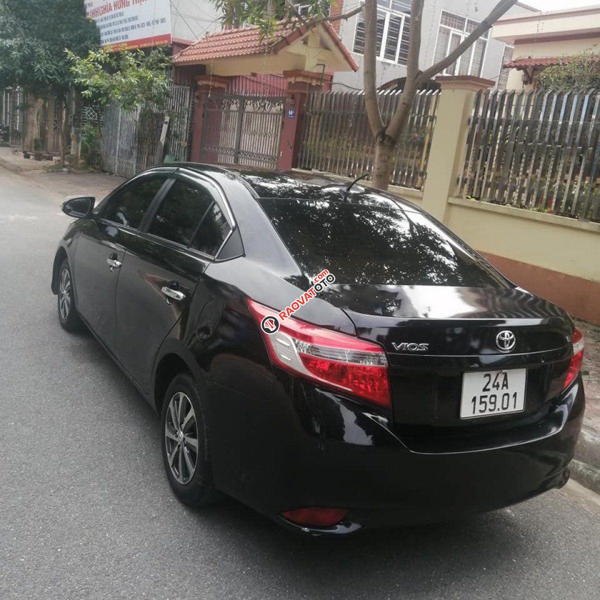 Xe Toyota Vios 1.5E năm 2014, màu đen còn mới-0