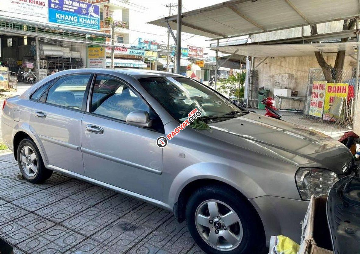 Cần bán lại xe Daewoo Lacetti EX đời 2010, màu bạc còn mới -0