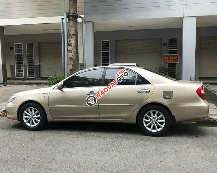 Bán Toyota Camry 3.0V sản xuất 2003, màu vàng còn mới, 265 triệu-0