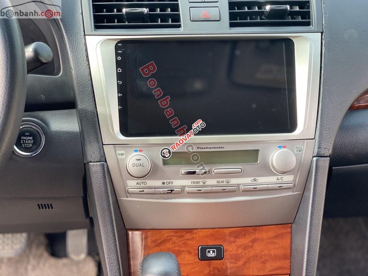 Bán xe Toyota Camry 3.5Q đời 2010, màu đen xe gia đình-0