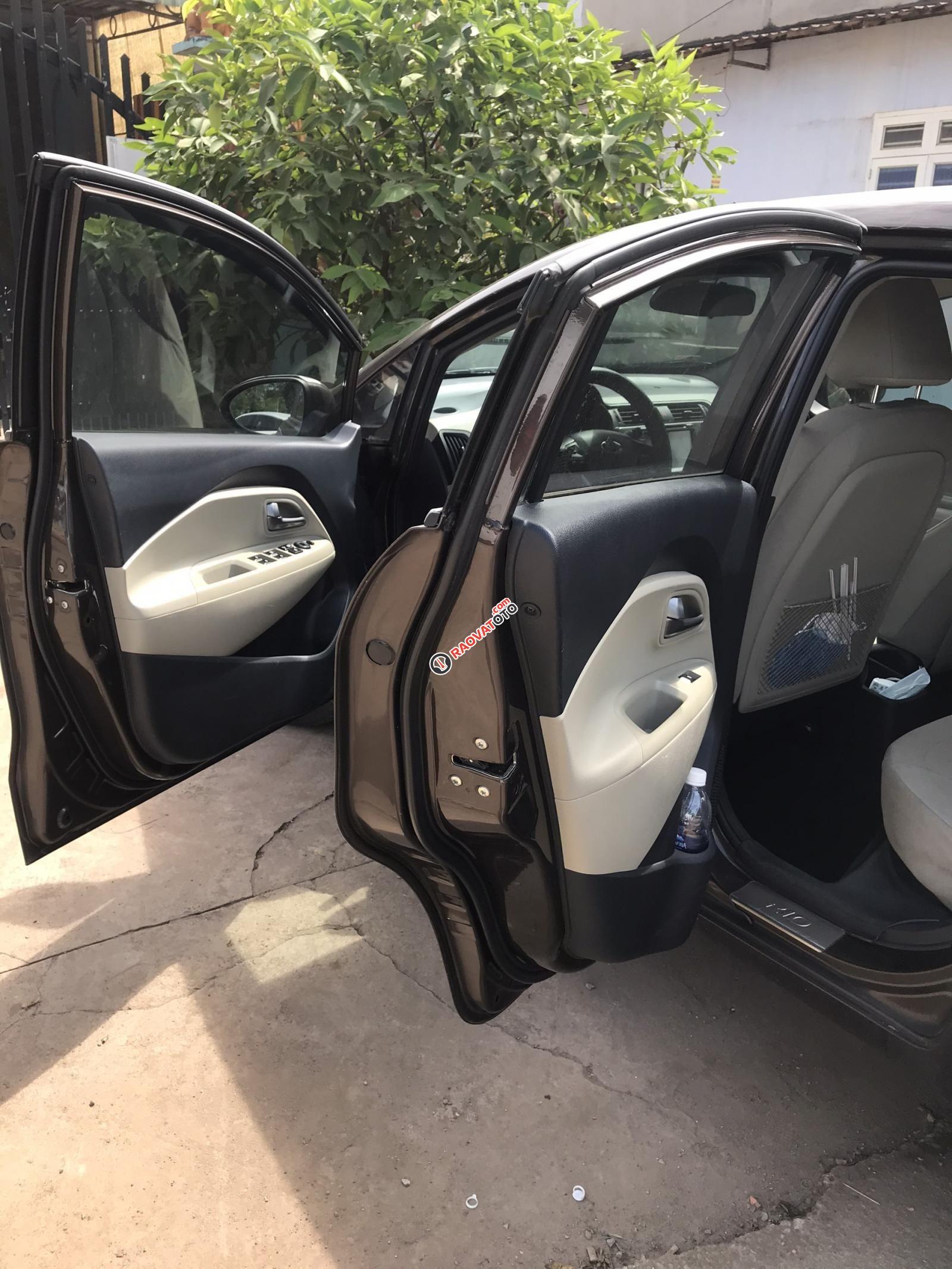 Cần bán lại xe Kia Rio 1.4 AT sản xuất 2015, màu đen, nhập khẩu  -0