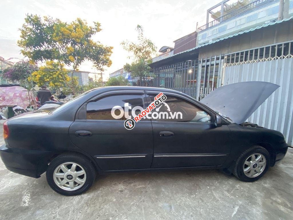 Bán xe Kia Spectra LS 2005, màu đen xe gia đình, 98tr-6