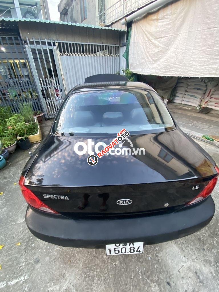 Bán xe Kia Spectra LS 2005, màu đen xe gia đình, 98tr-2