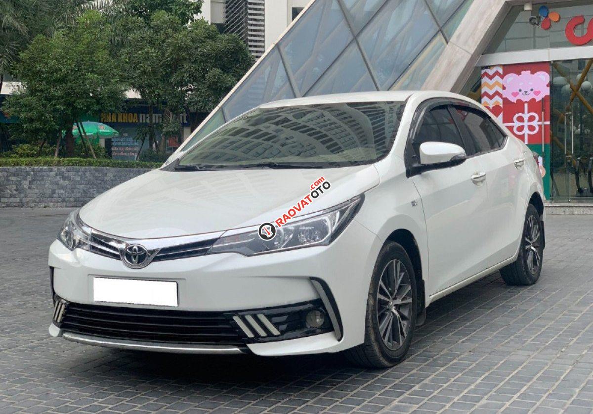 Bán Toyota Corolla Altis 1.8G AT 2019, màu trắng chính chủ giá cạnh tranh-3