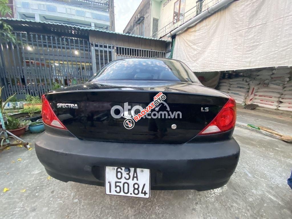 Bán xe Kia Spectra LS 2005, màu đen xe gia đình, 98tr-1