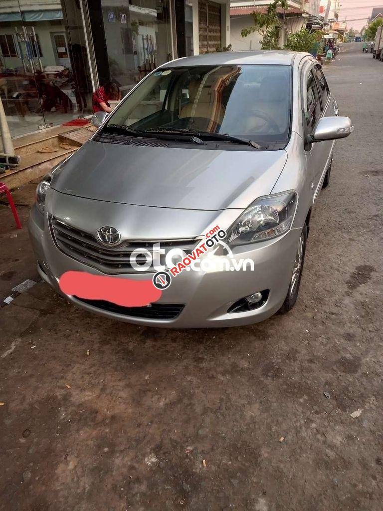 Bán Toyota Vios MT sản xuất 2012, màu bạc xe gia đình-2