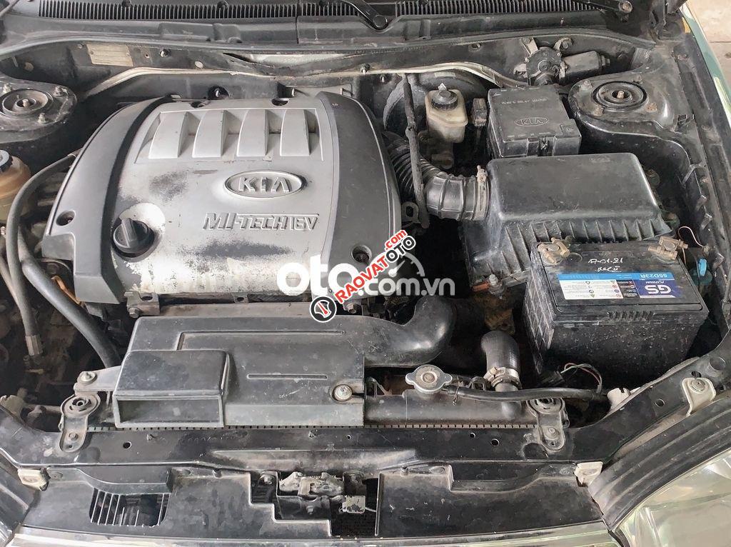 Bán xe Kia Spectra MT sản xuất năm 2004, màu đen, nhập khẩu nguyên chiếc, xe gia đình-3