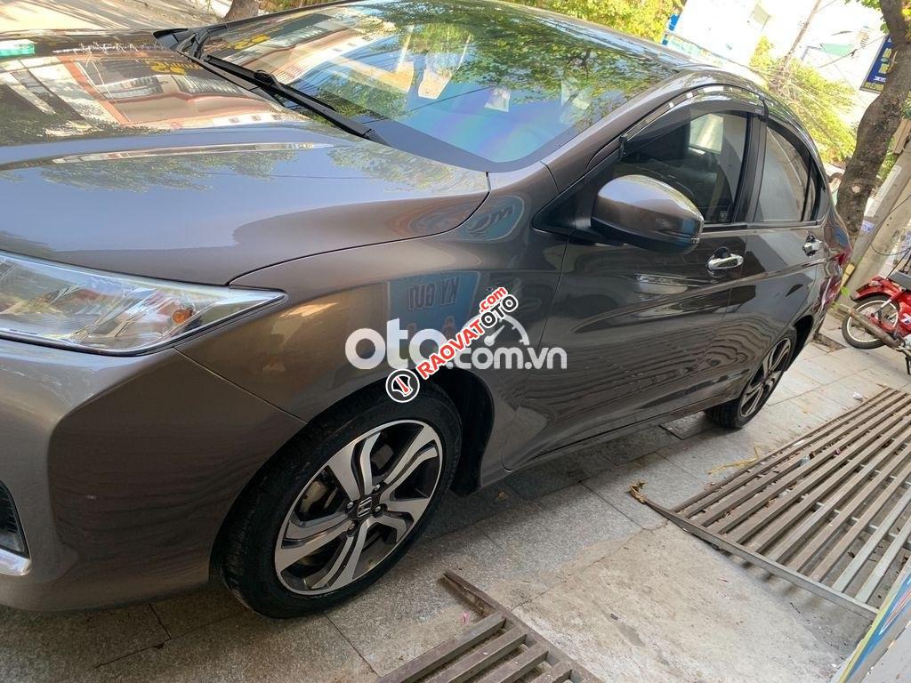 Bán Honda City AT năm sản xuất 2014, màu nâu xe gia đình-0