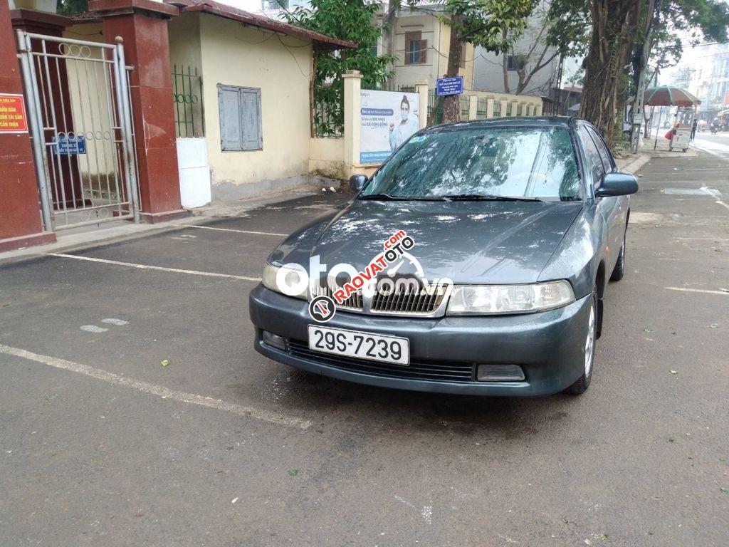 Cần bán gấp Mitsubishi Lancer GLX sản xuất năm 2003 số sàn, 105tr-2