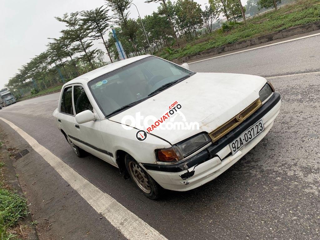 Xe Mazda 323 2.0MT sản xuất năm 1994, màu trắng, xe nhập-1