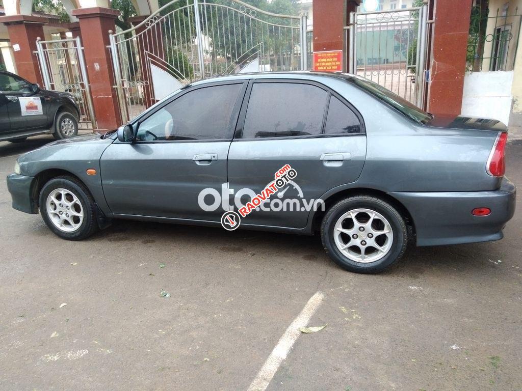 Cần bán gấp Mitsubishi Lancer GLX sản xuất năm 2003 số sàn, 105tr-0