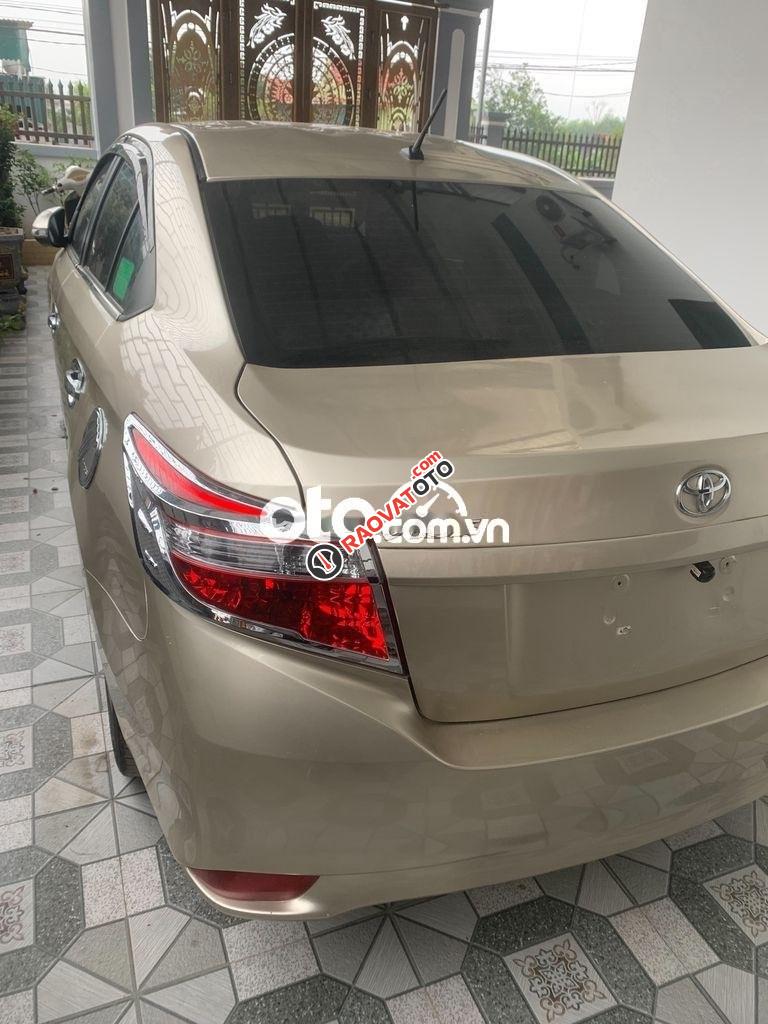 Cần bán lại xe Toyota Vios 1.5E năm sản xuất 2015, màu vàng giá cạnh tranh-10