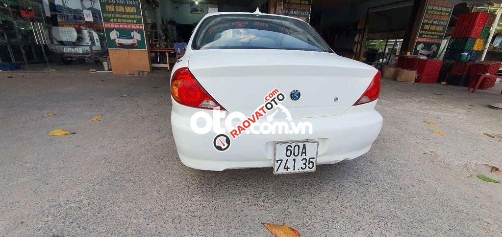 Xe Kia Spectra MT sản xuất 2004, màu trắng-1