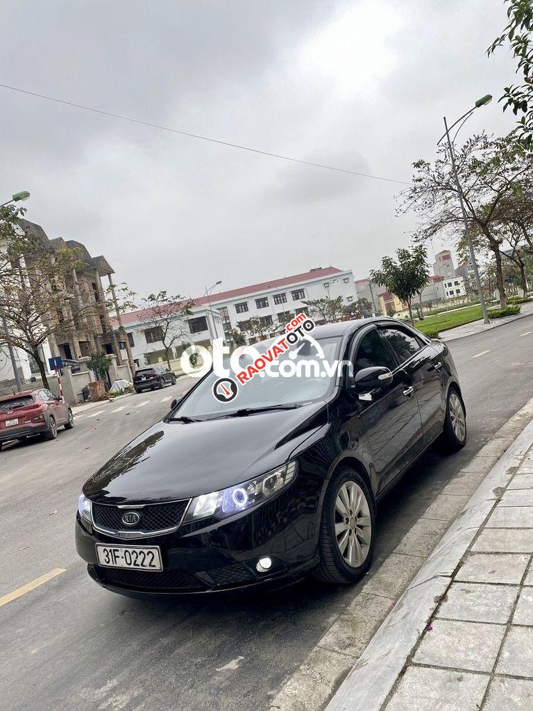 Cần bán Kia Forte 1.6MT năm sản xuất 2010, màu đen  
-1