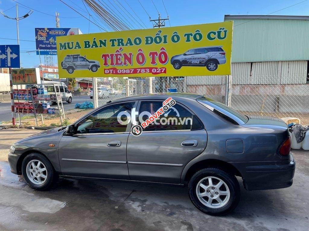 Cần bán gấp Mazda 323 GLX năm sản xuất 1998, màu xám, giá chỉ 60 triệu-0