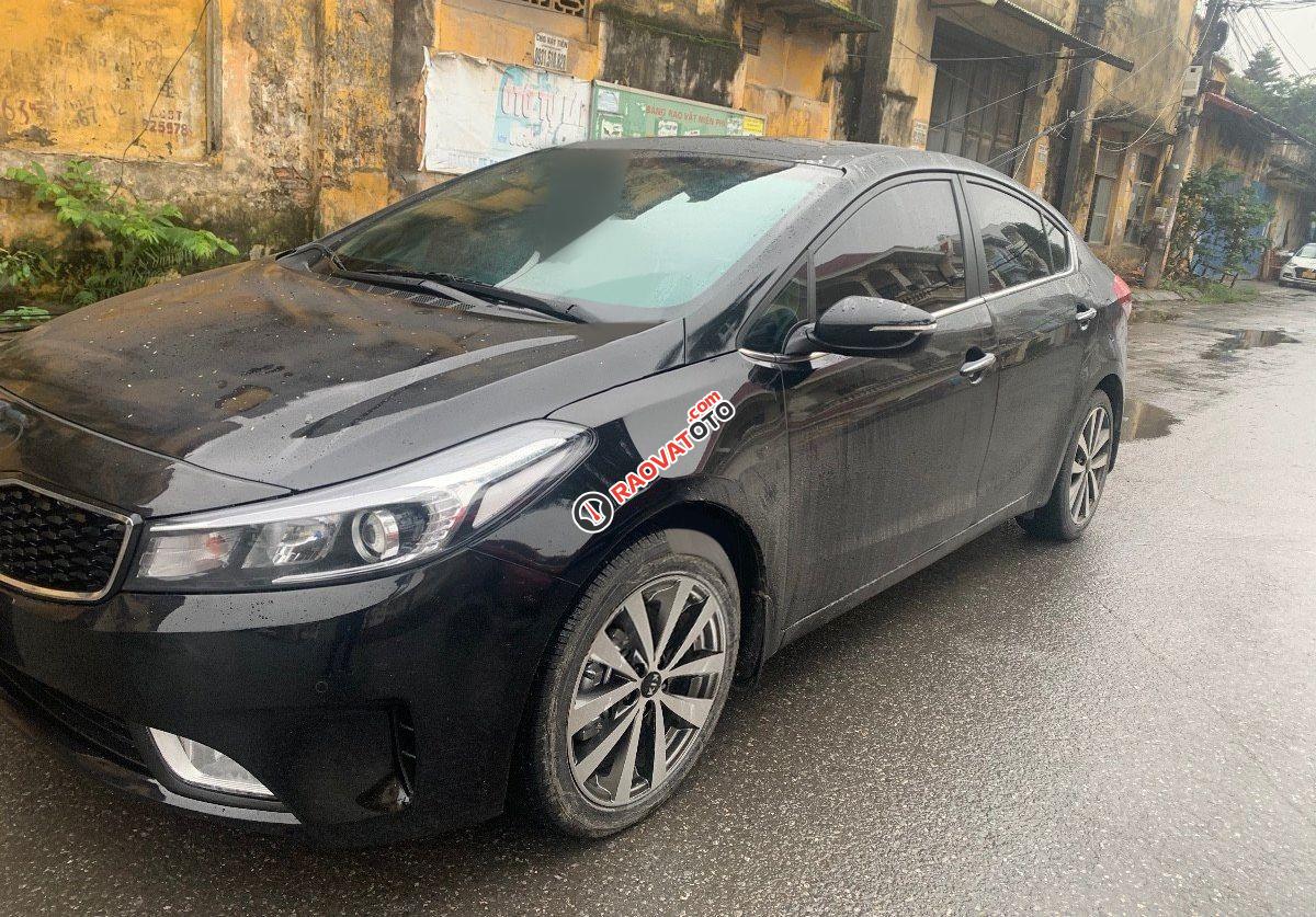 Cần bán Kia Cerato 1.6MT sản xuất năm 2017, màu đen, 445tr-3