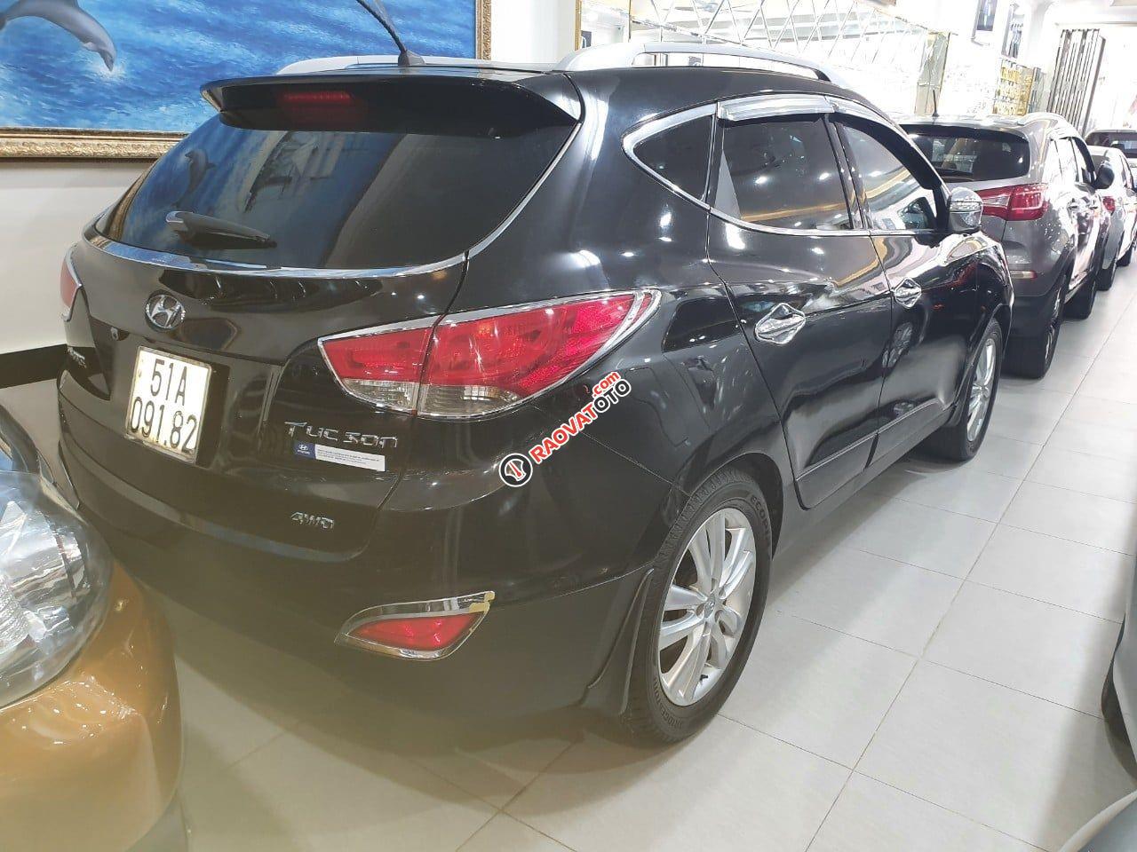 Bán Hyundai Tucson 2.0AT 4WD sản xuất 2011, màu đen, xe nhập-4