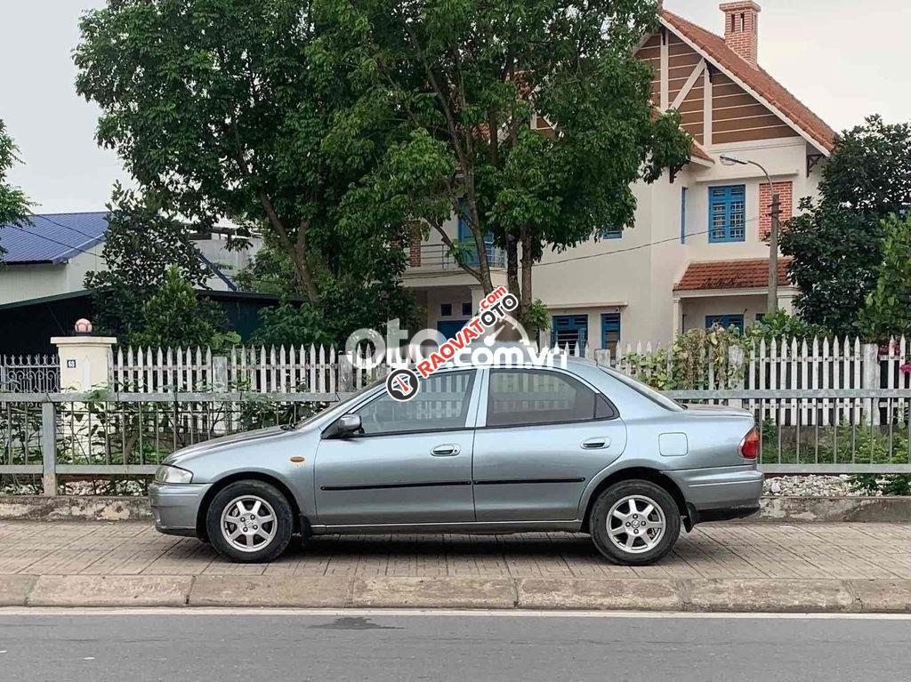 cần bán xe masda 323 GLXI sx1999.-1