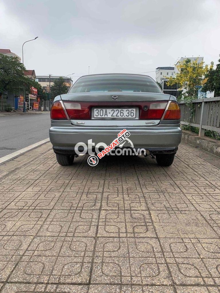 cần bán xe masda 323 GLXI sx1999.-3