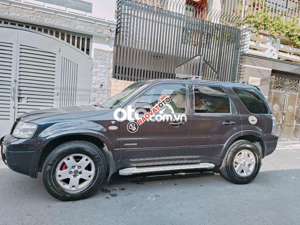 xe đang chạy thanh lý Ford escape 2004 3.0V6-4