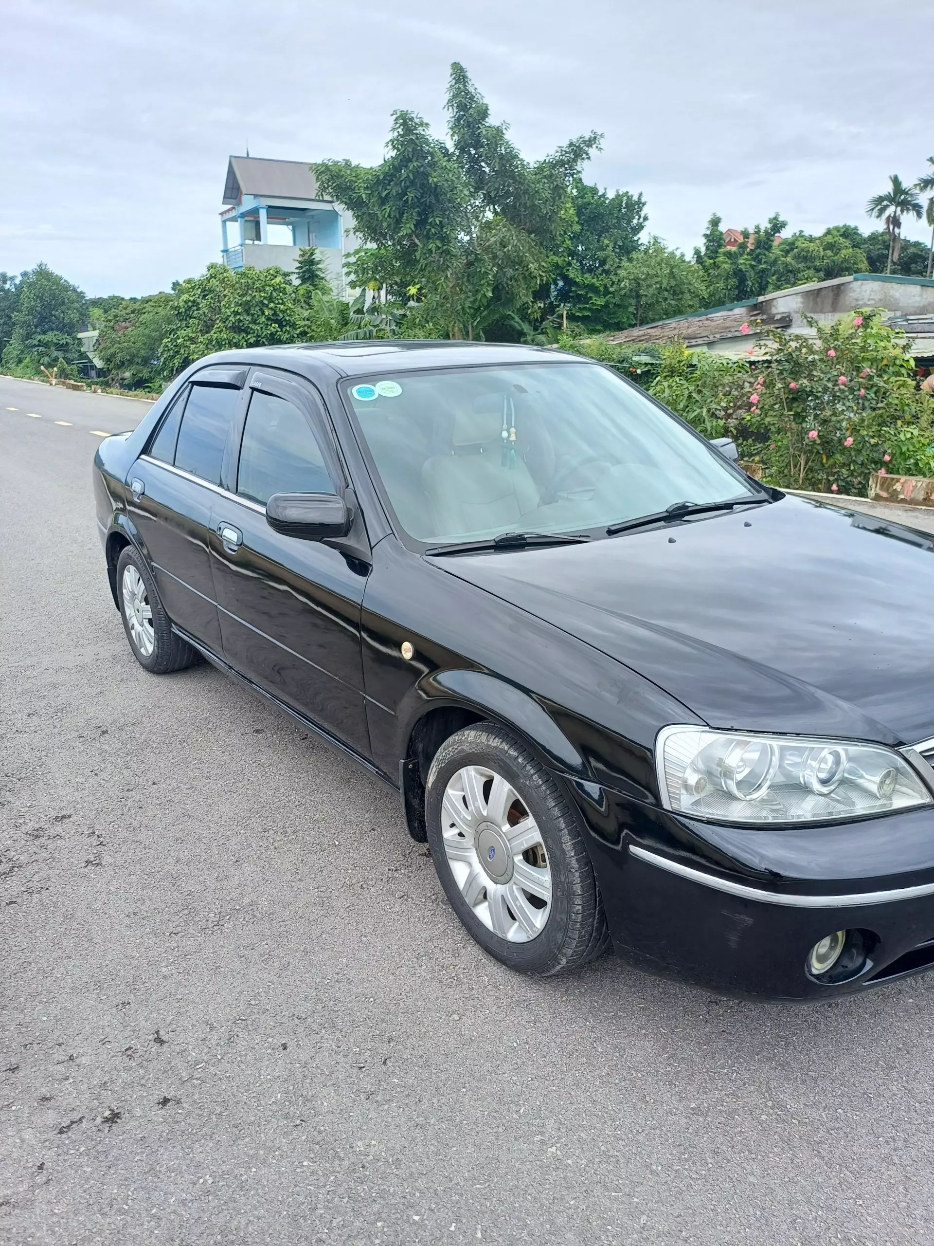 CẦN BÁN XE  FORD  LASER 2004 AT-4