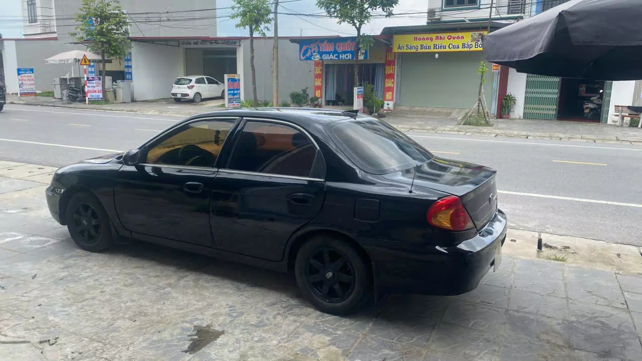 Cần bán xe Kia Spectra 2003 - Giá chỉ 45 triệu-2
