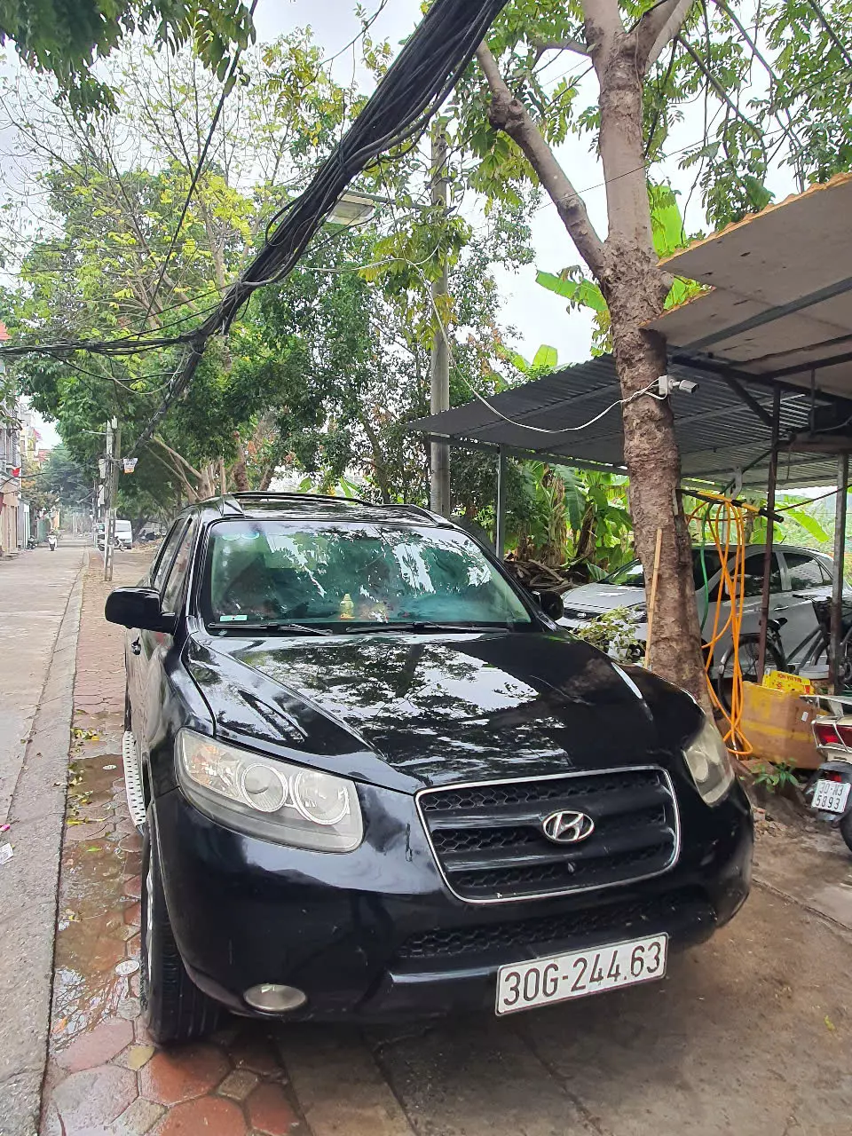 Chính chủ bán xe SANTAFE đăng ký 2009  máy  xăng 12 lít /100km, số tay-0