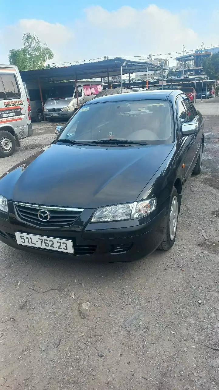 Chiếc Mazda 626 màu đen sản xuất năm 2001 đang tìm chủ mới.-4