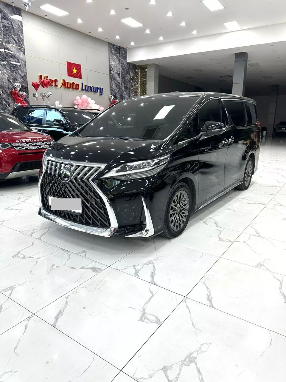 Bán xe Lexus LM350 sản xuất năm 2021 màu đen nội thất kem, xe nhập chính hãng từ đầu,-0