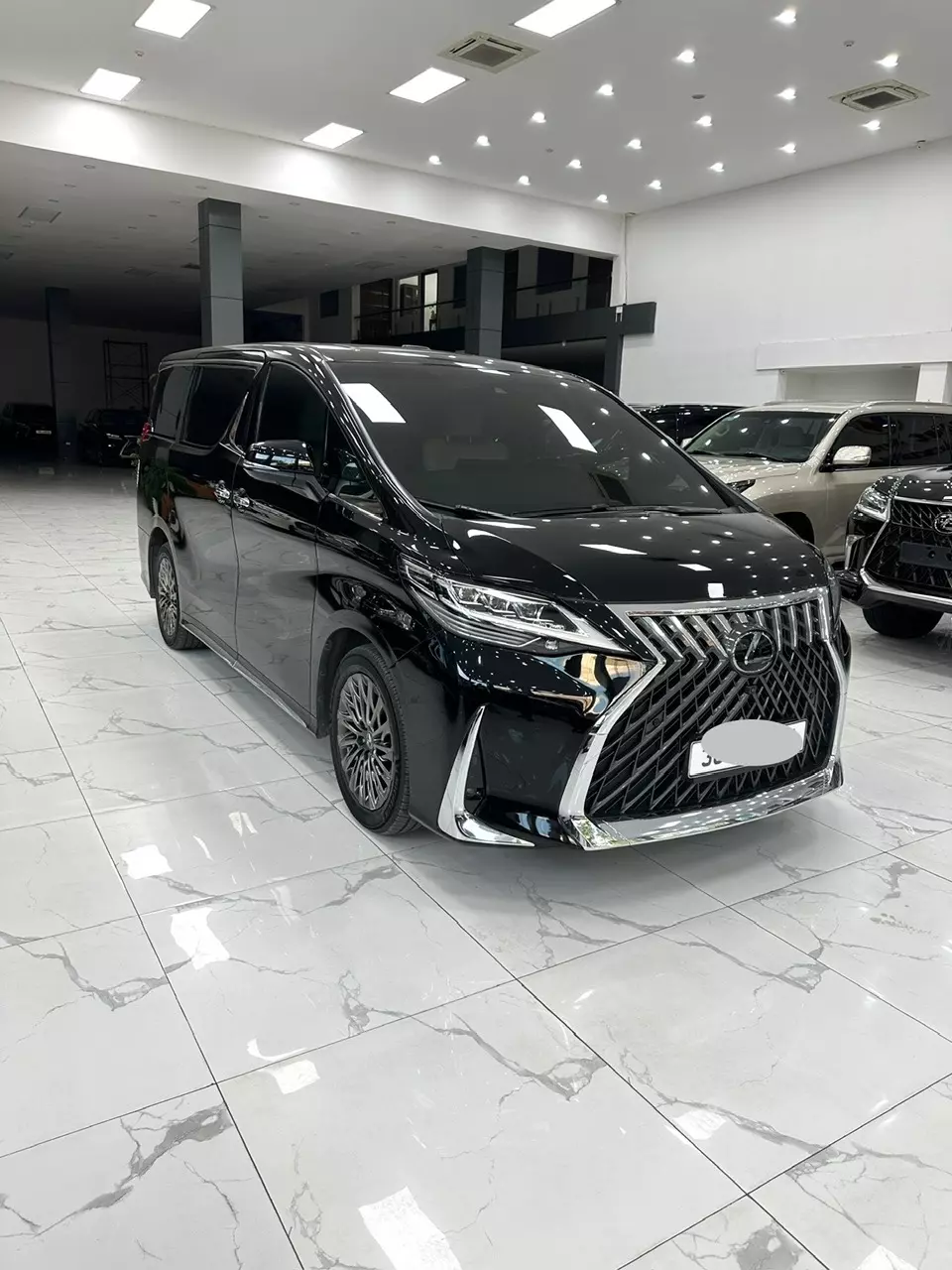 Bán xe Lexus LM350 sản xuất năm 2021 màu đen nội thất kem, xe nhập chính hãng từ đầu,-1