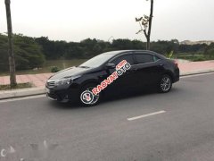 Cần bán lại xe Toyota Corolla altis 1.8 đời 2016, màu đen