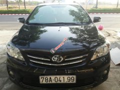 Chính chủ bán Toyota Corolla altis G đời 2011, màu đen