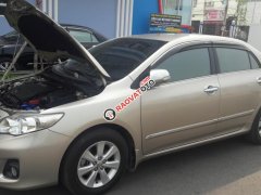 Bán Toyota Corolla altis G năm sản xuất 2014, màu vàng chính chủ giá cạnh tranh