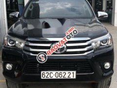 Bán Toyota Hilux 3.0G năm 2015, màu đen như mới, giá 708tr