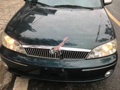 Cần bán lại xe Ford Laser GHIA sản xuất 2003, màu xanh lam, 185tr