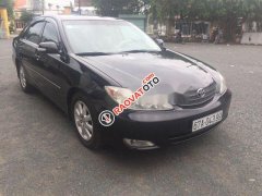 Chính chủ bán xe Toyota Camry 3.0 sản xuất 2003, màu đen, nhập khẩu