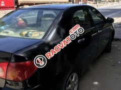 Cần bán lại xe Toyota Corolla altis 1.3 năm sản xuất 2003, màu đen