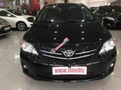 Cần bán Toyota Corolla Altis 1.8MT 2011, màu đen