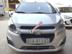 Bán Chevrolet Spark LTZ 1.0AT màu bạc, số tự động sản xuất cuối 2014, biển Sài Gòn, 1 đời chủ chạy đúng 30.000km