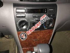 Cần bán Toyota Corolla LE 2005, màu trắng, nhập khẩu nguyên chiếc số tự động
